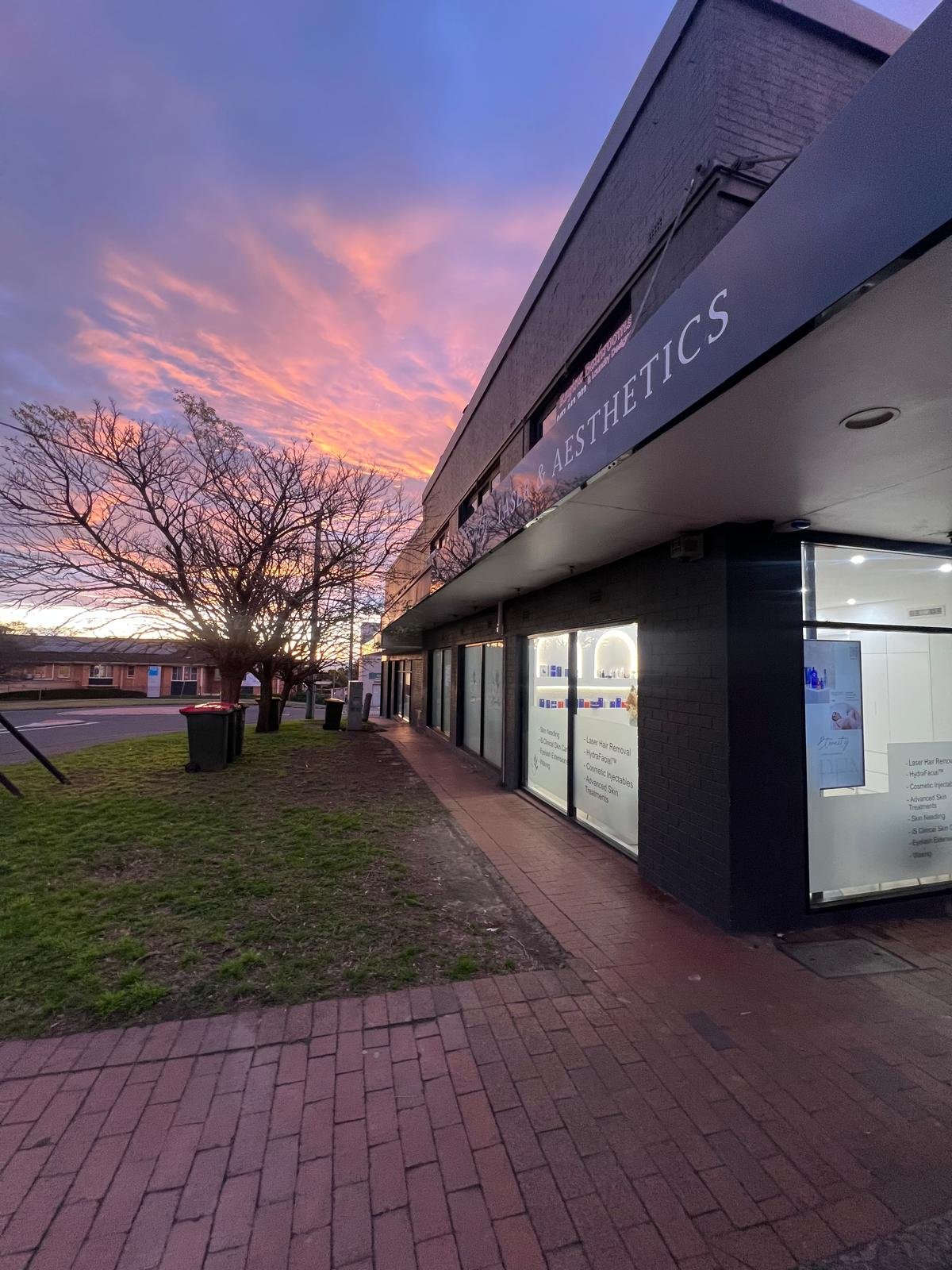 Eternity Laser & Aesthetics clinic exterior at sunset — 12 minutes from Bella Vista